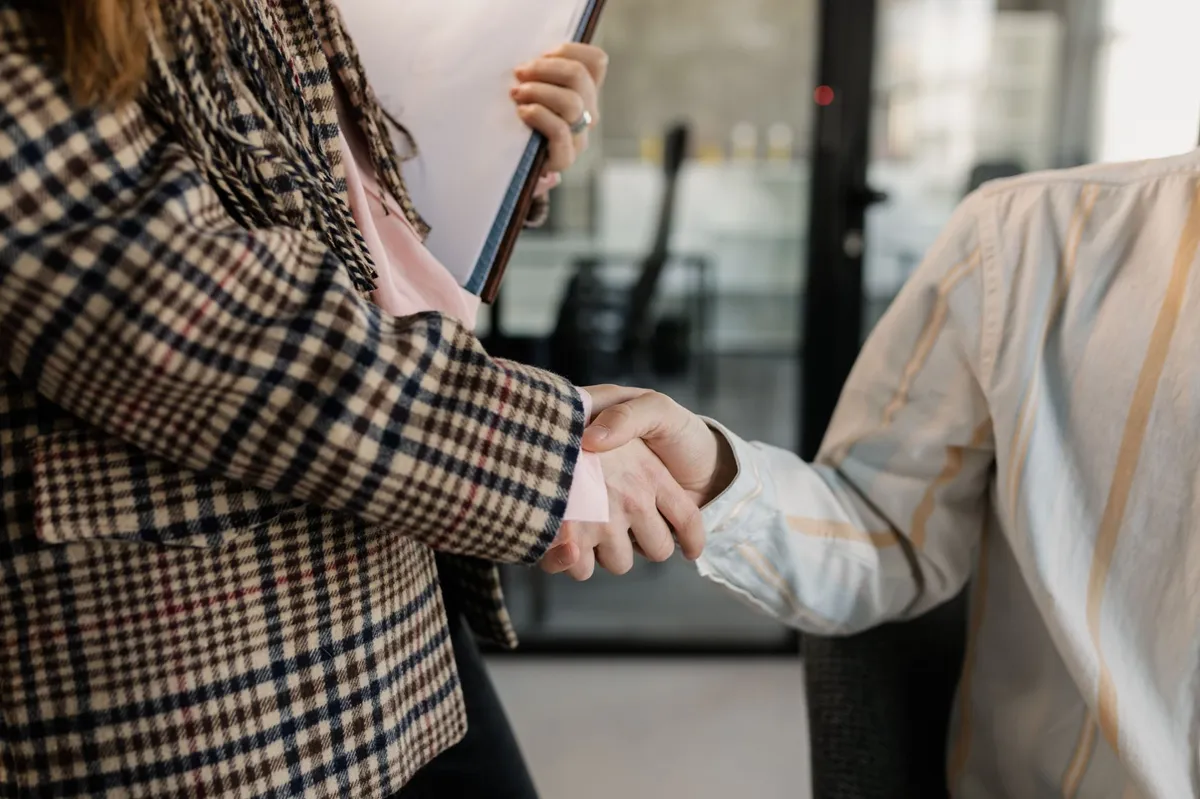 business handshake closeup