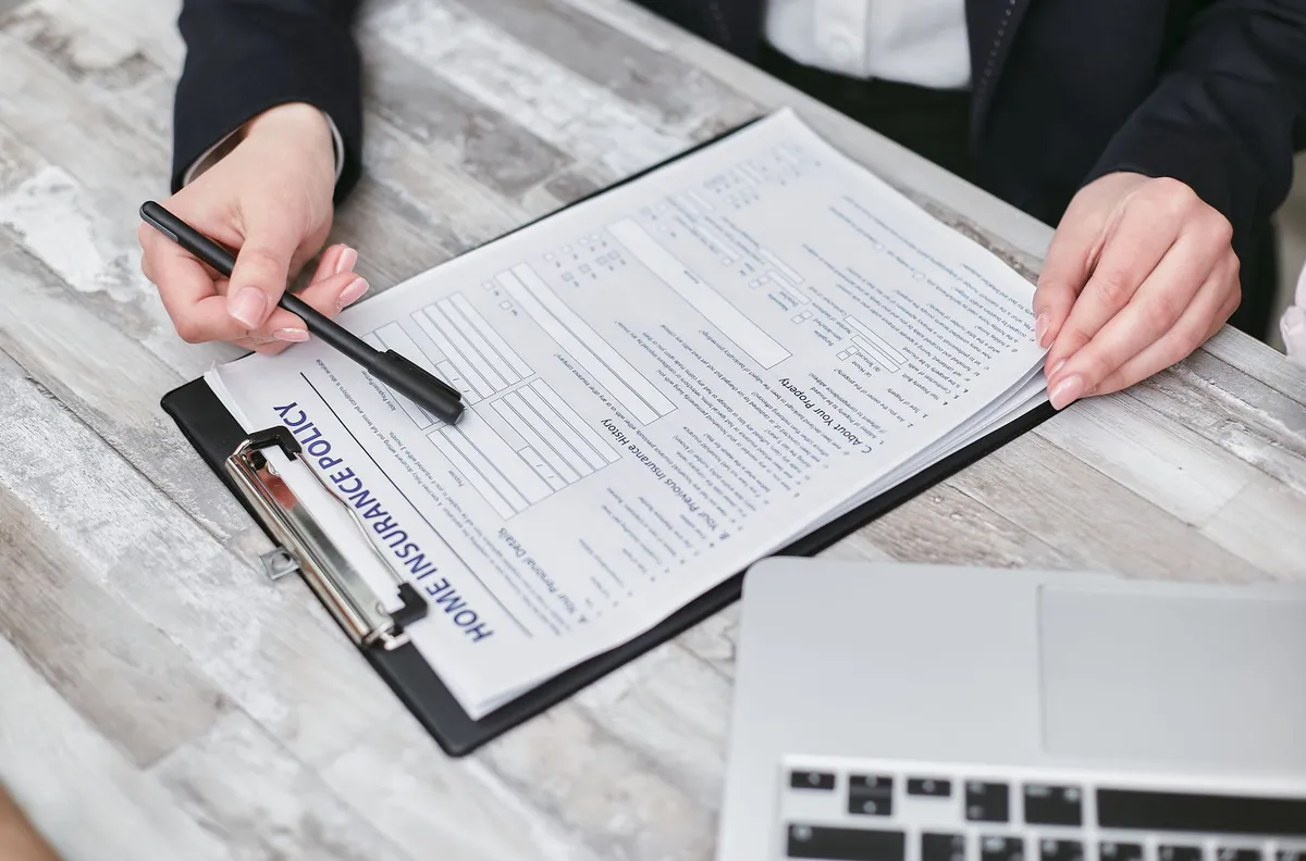 person reviewing insurance policy