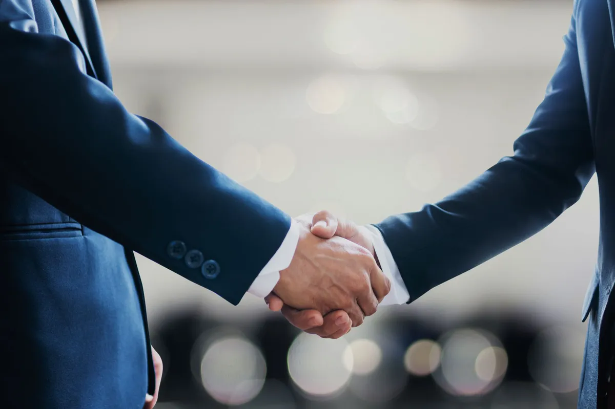 business people shaking hands