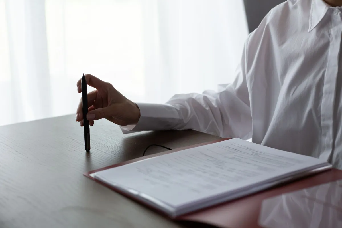 underwriter reviewing documents