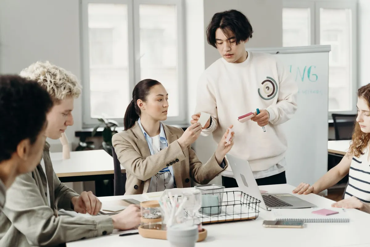 office workers discussing AI