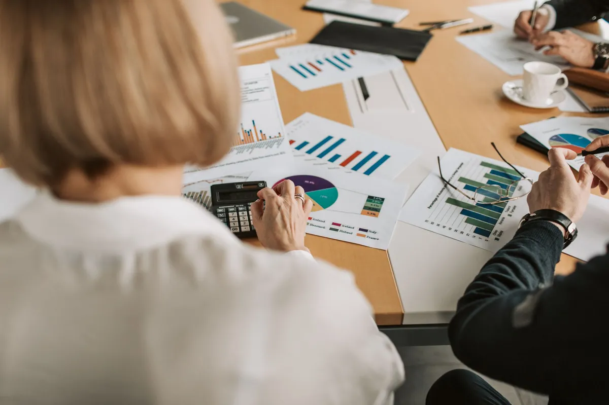 business meeting with graphs