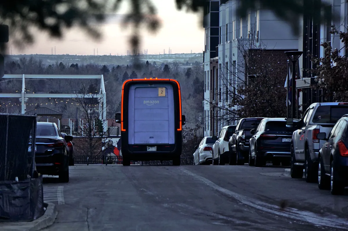 Amazon delivery van on road