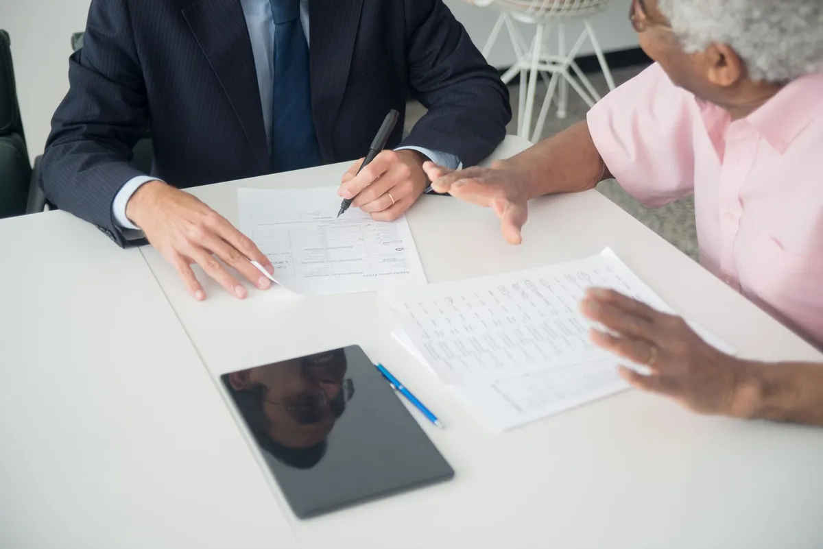 business owner consulting with insurance agent