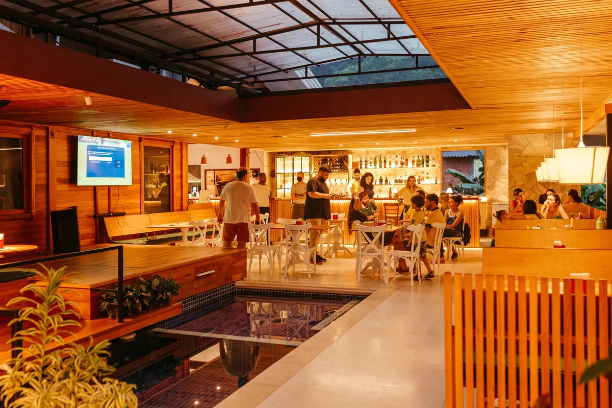 bar with patrons enjoying drinks