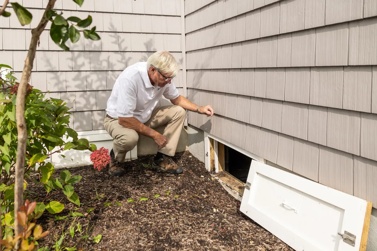 contractor inspecting roof
