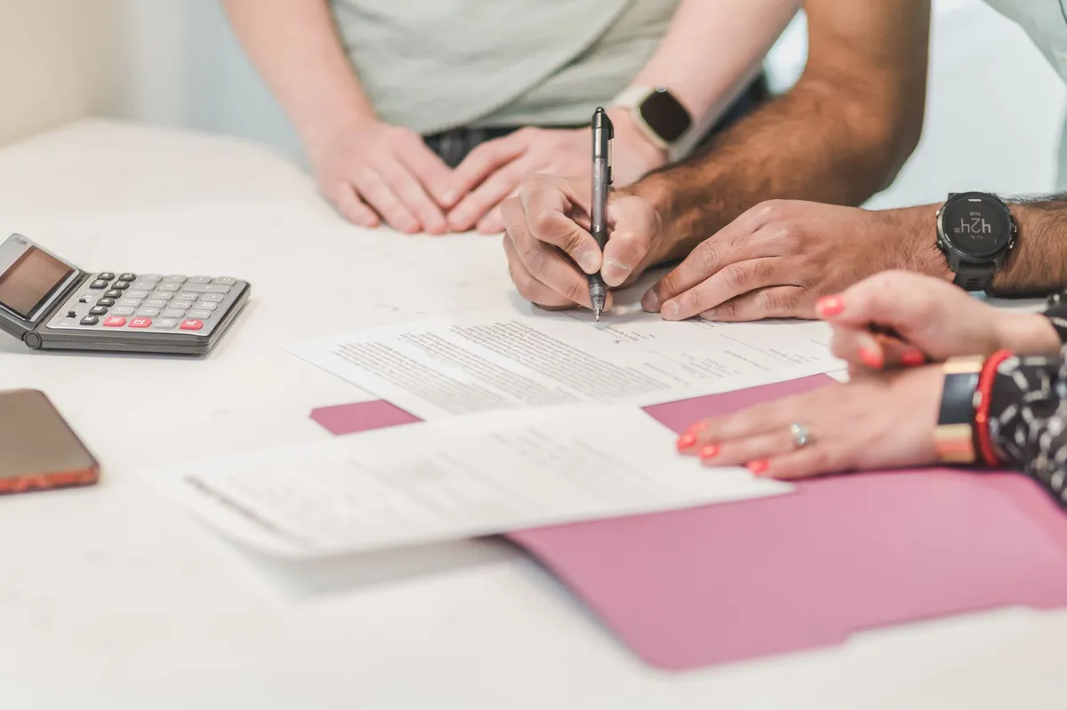 insurance paperwork and calculator