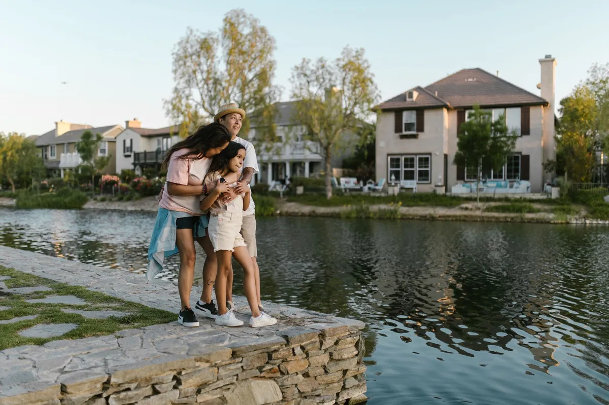 family looking at house