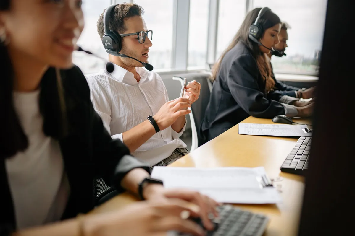 call center employees working