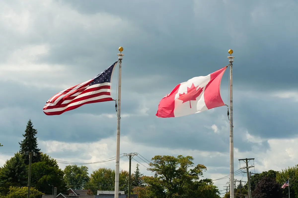 Canadian and American flags