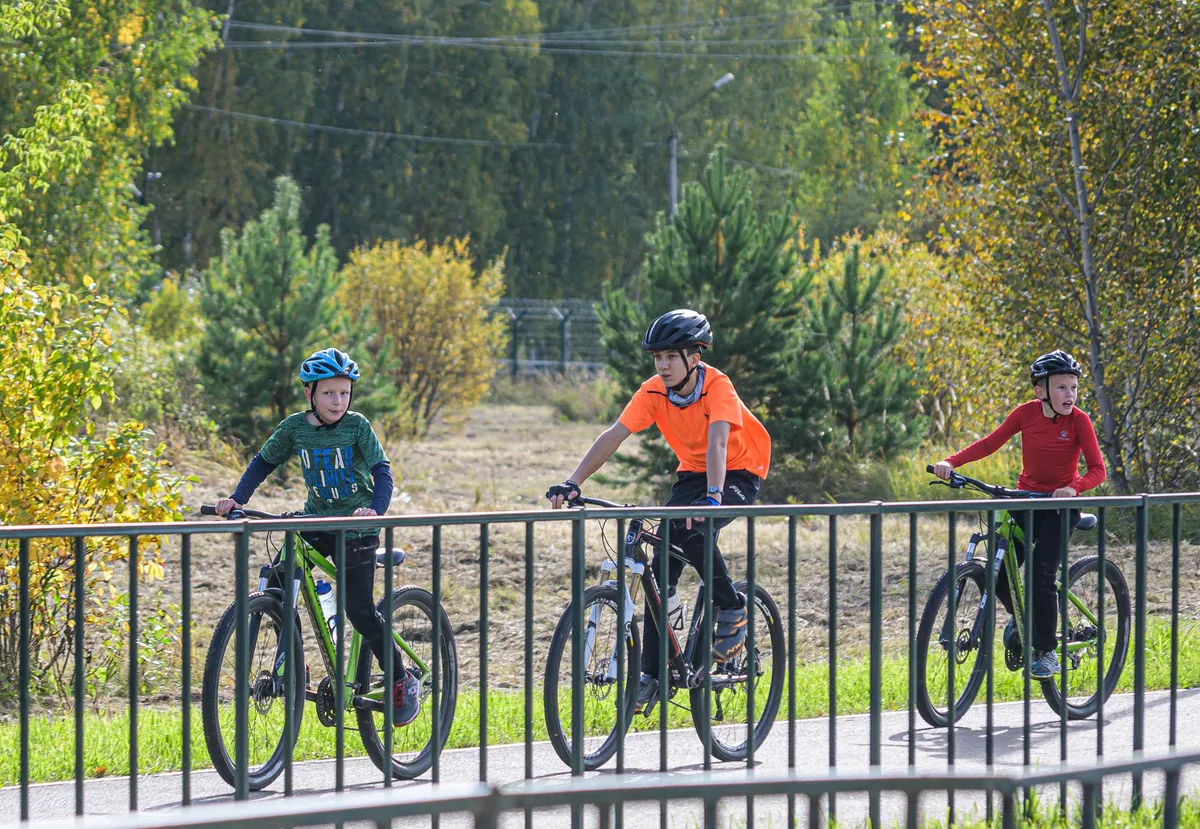 group of kids on e-bikes