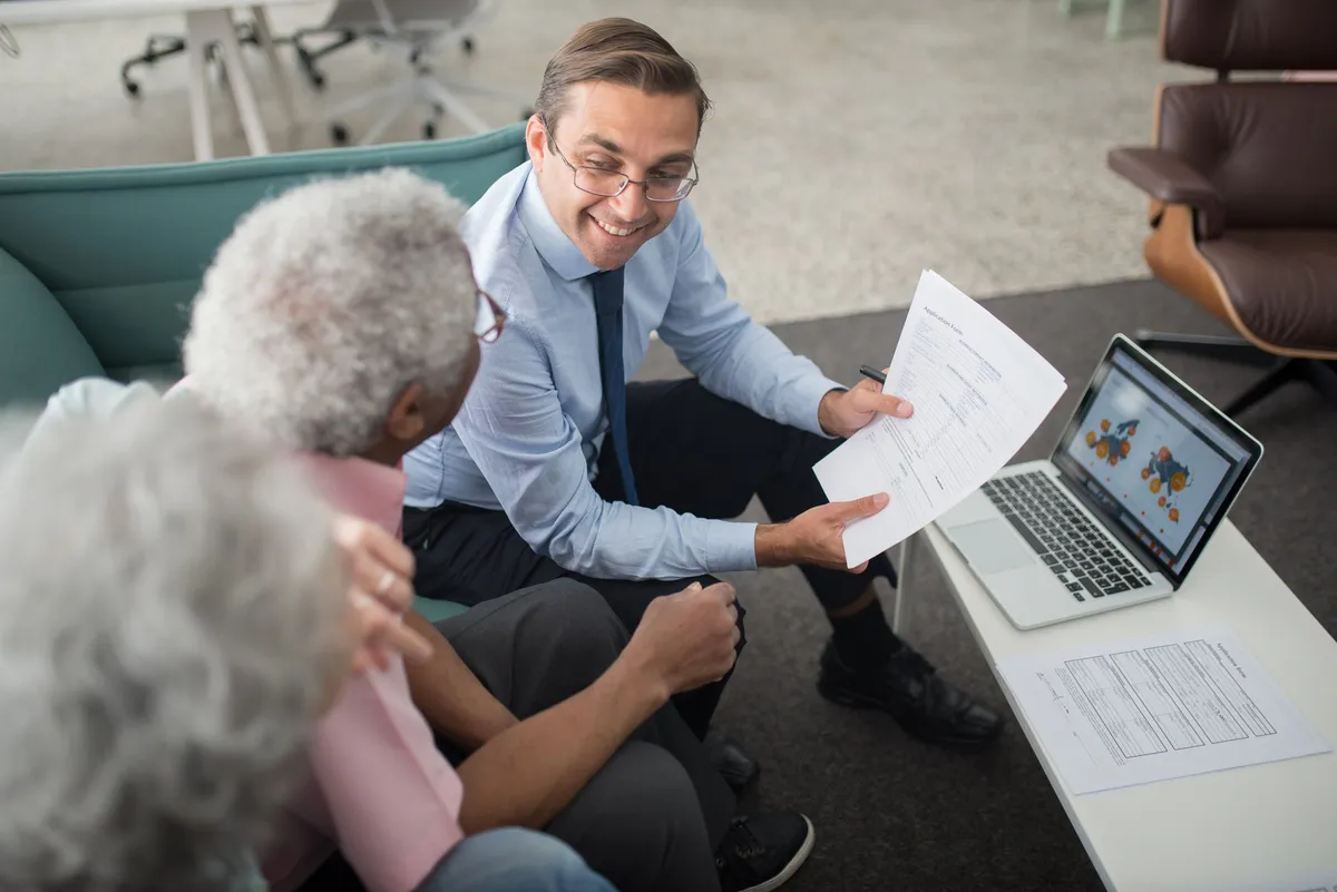 insurance agent helping client