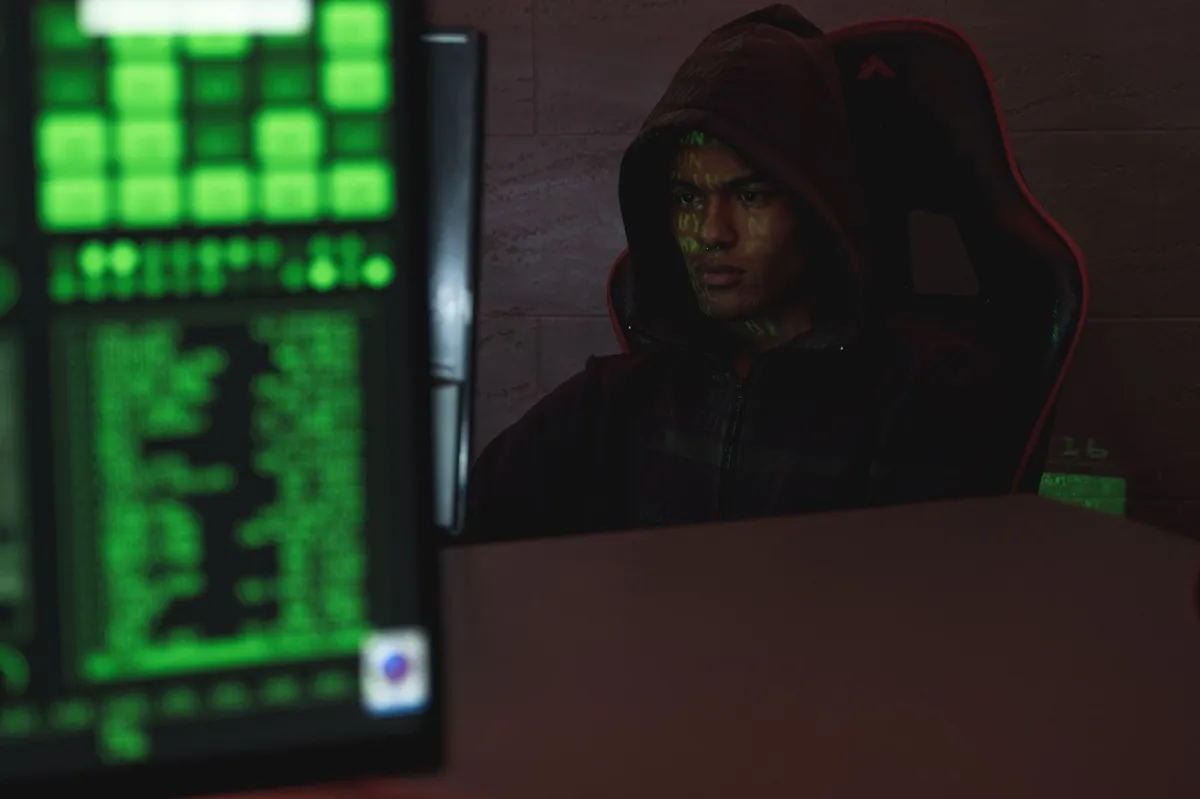 hacker in dark room