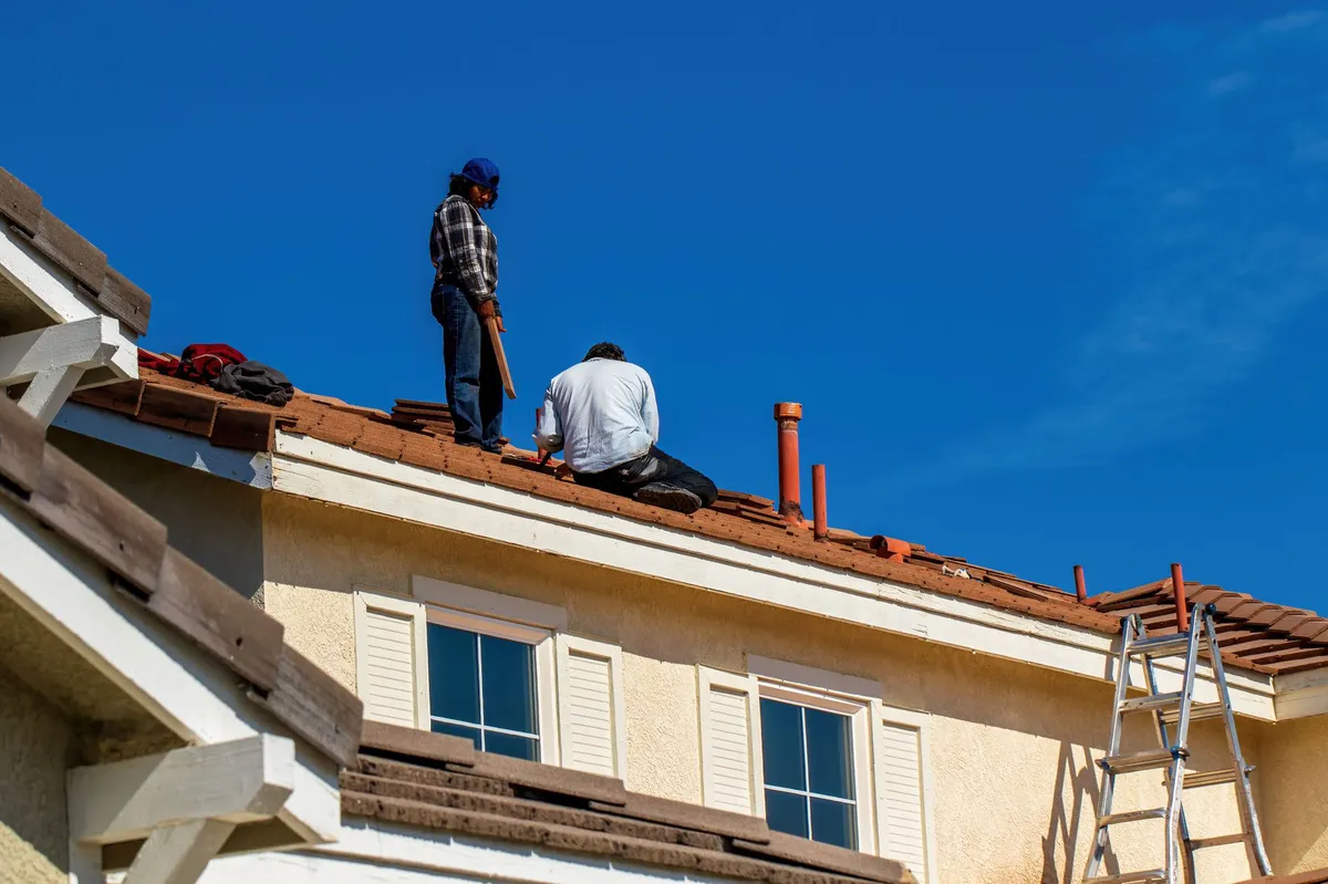 construction workers on roof