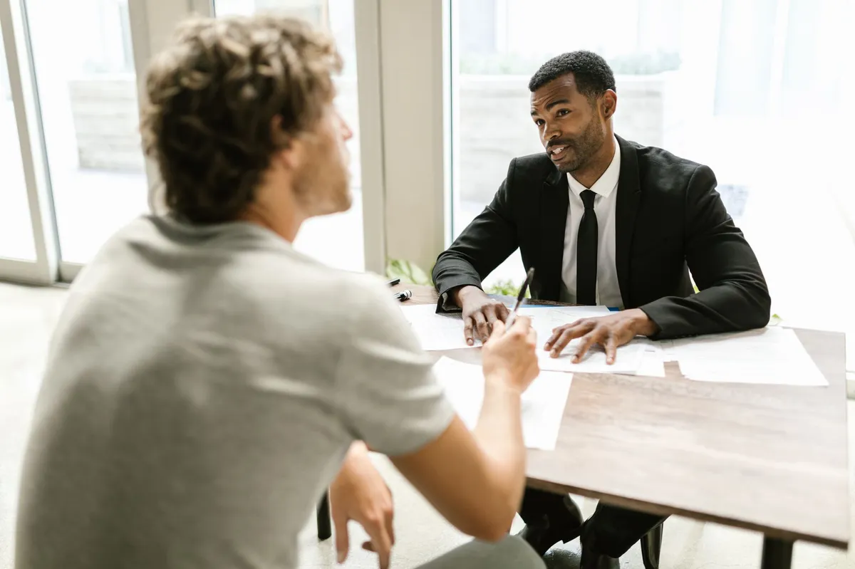 insurance broker advising client