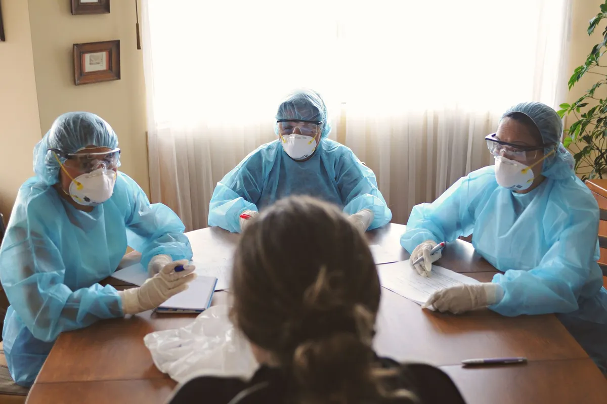 healthcare professionals discussing outbreak