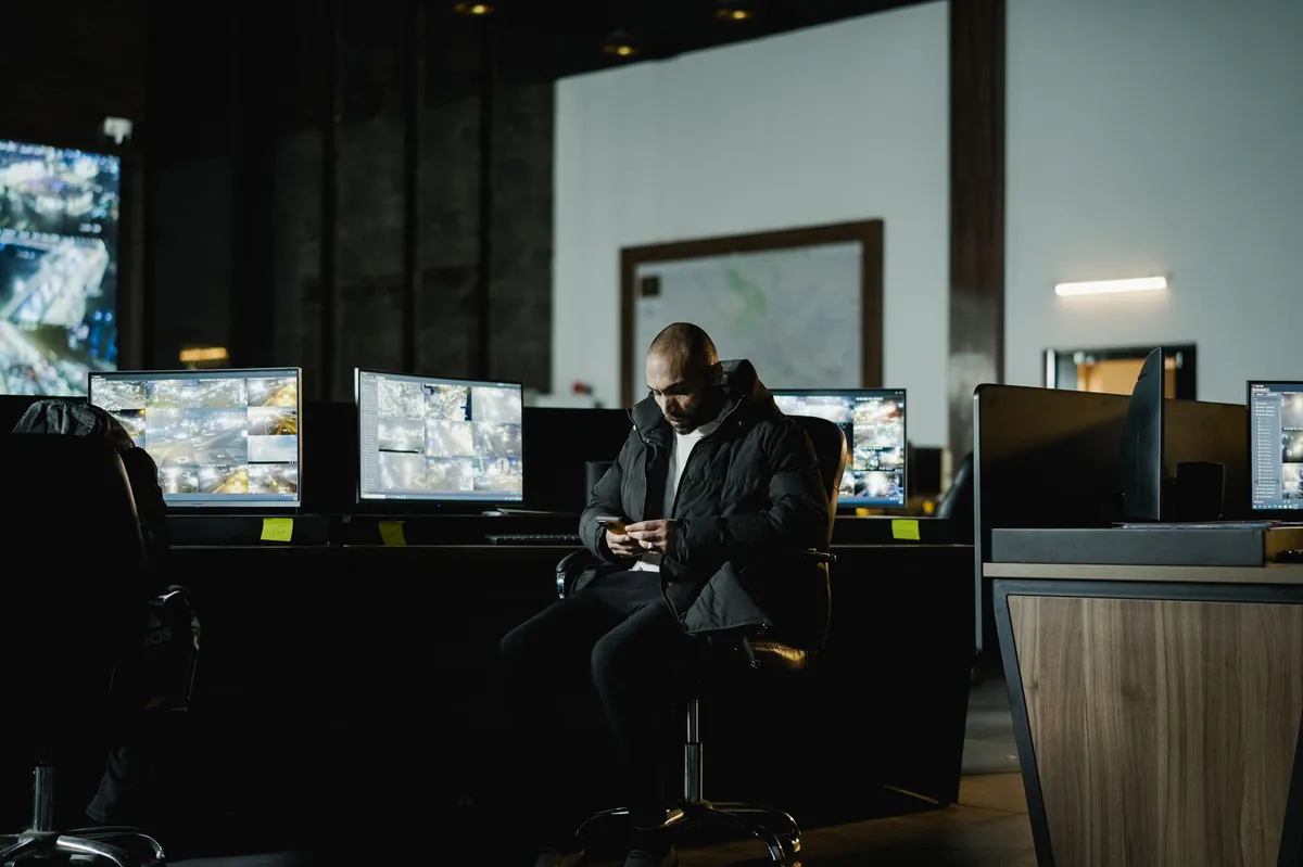 security guard monitoring CCTV