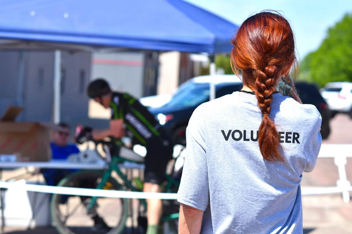 athlete volunteer smiling