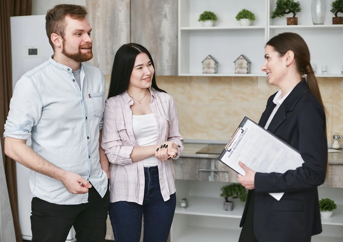 happy insurance agents discussing