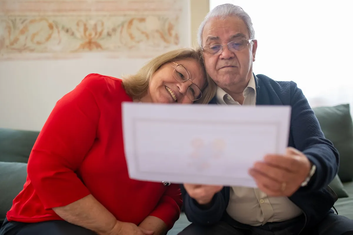 senior couple reviewing documents