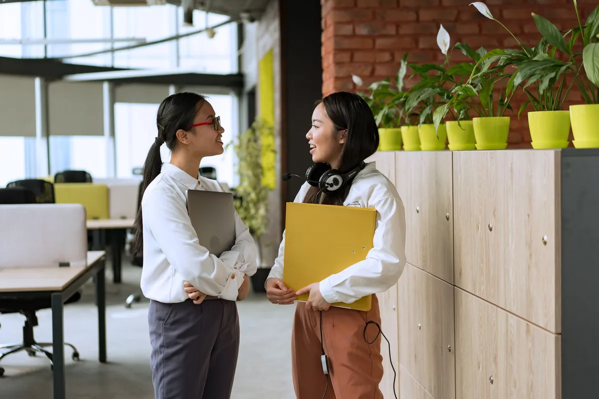 office workers discussing health benefits