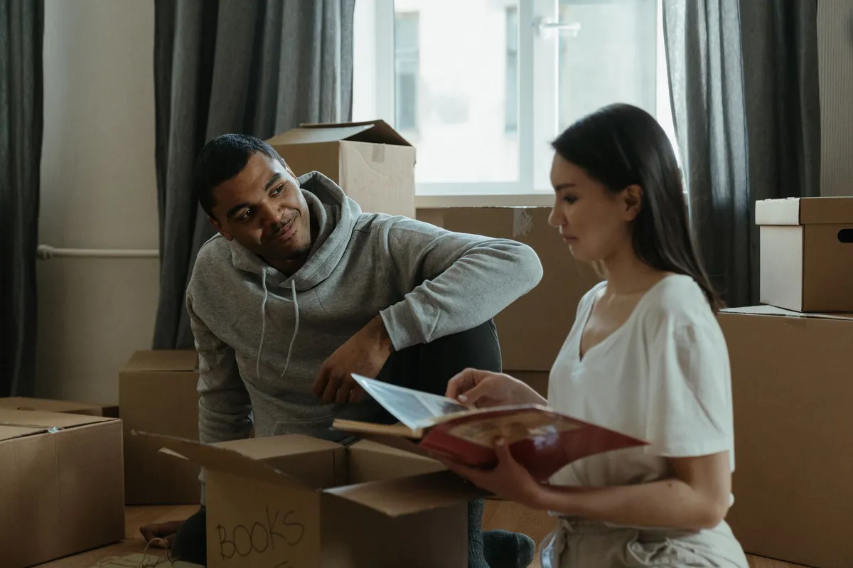 happy couple moving into new apartment