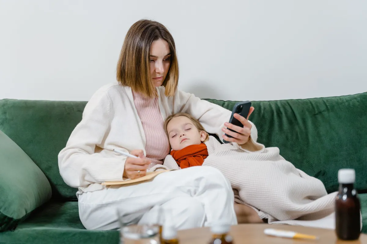 concerned parent looking at phone