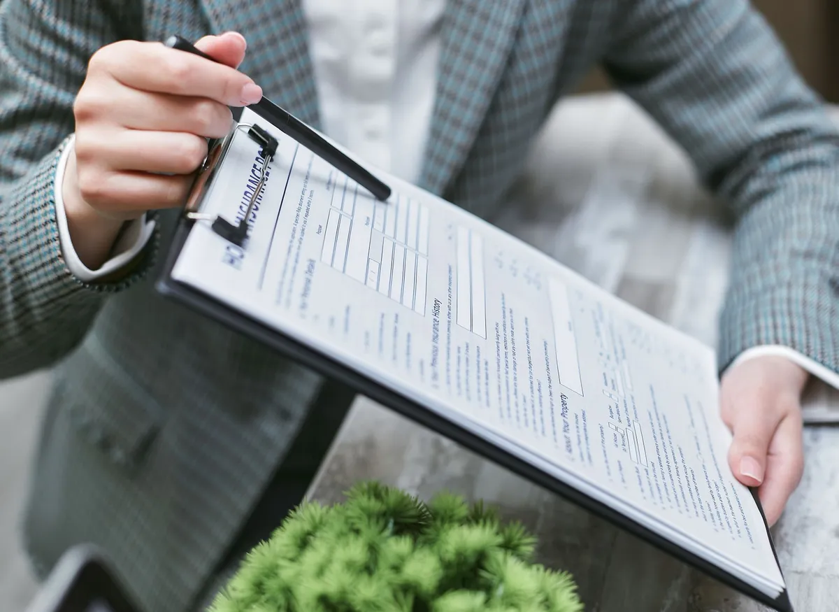 insurance underwriter reviewing data