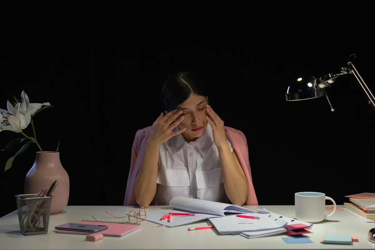 stressed worker at desk