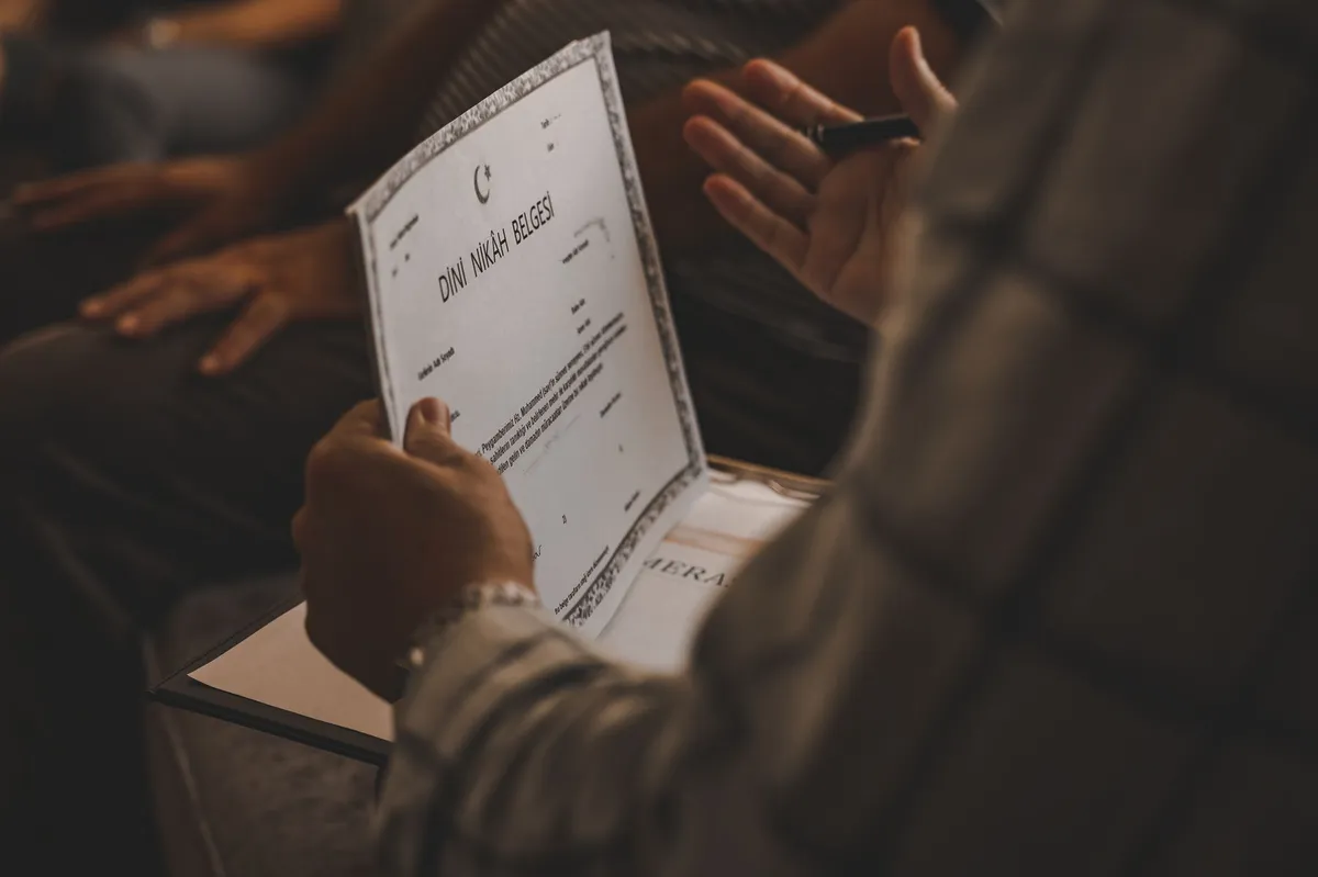 legal documents in hands