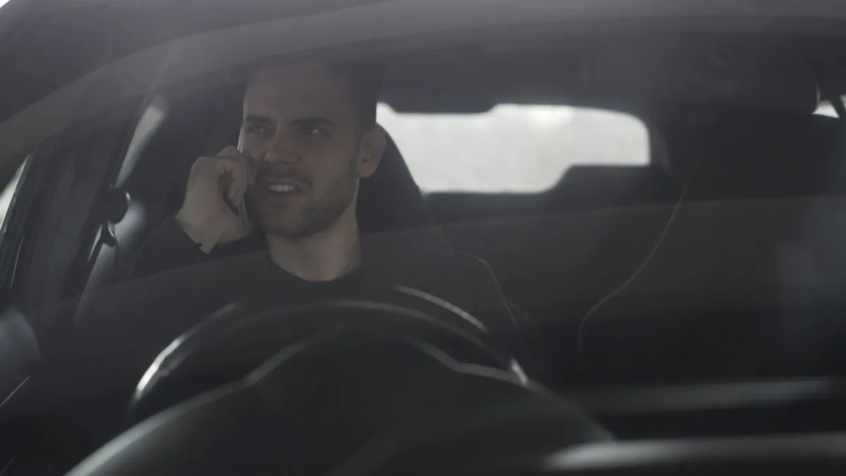 concerned driver at wheel