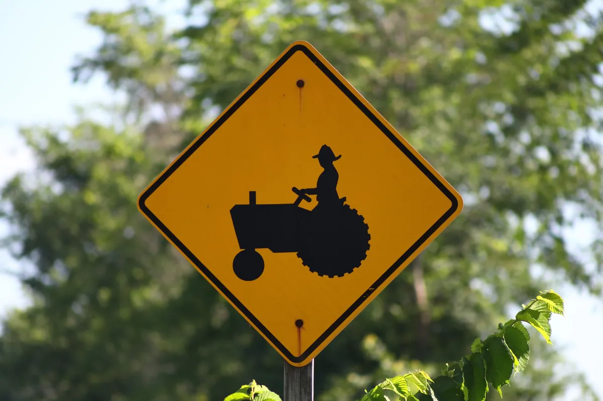 lettuce farm with warning signs