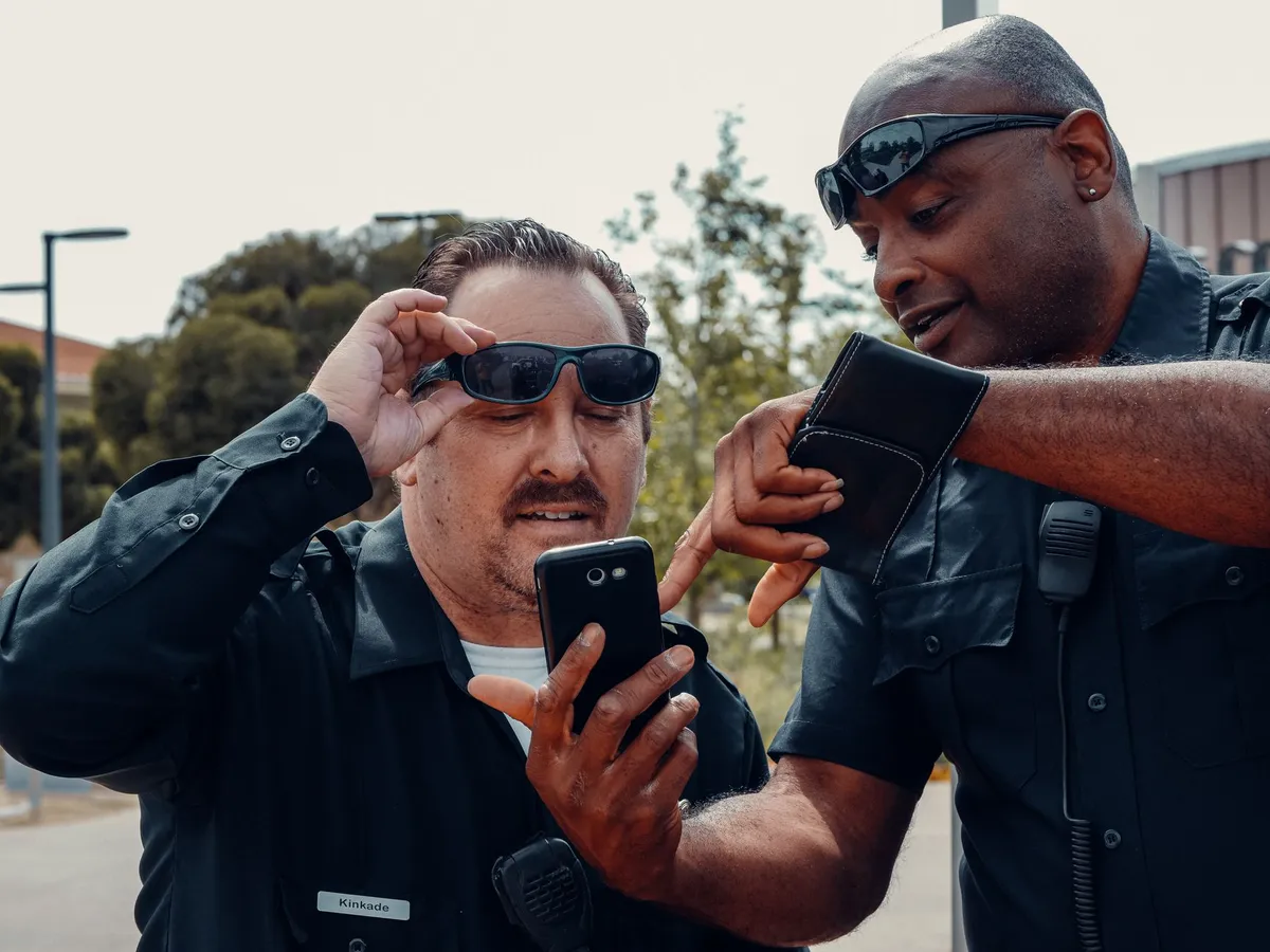 law enforcement officers discussing technology