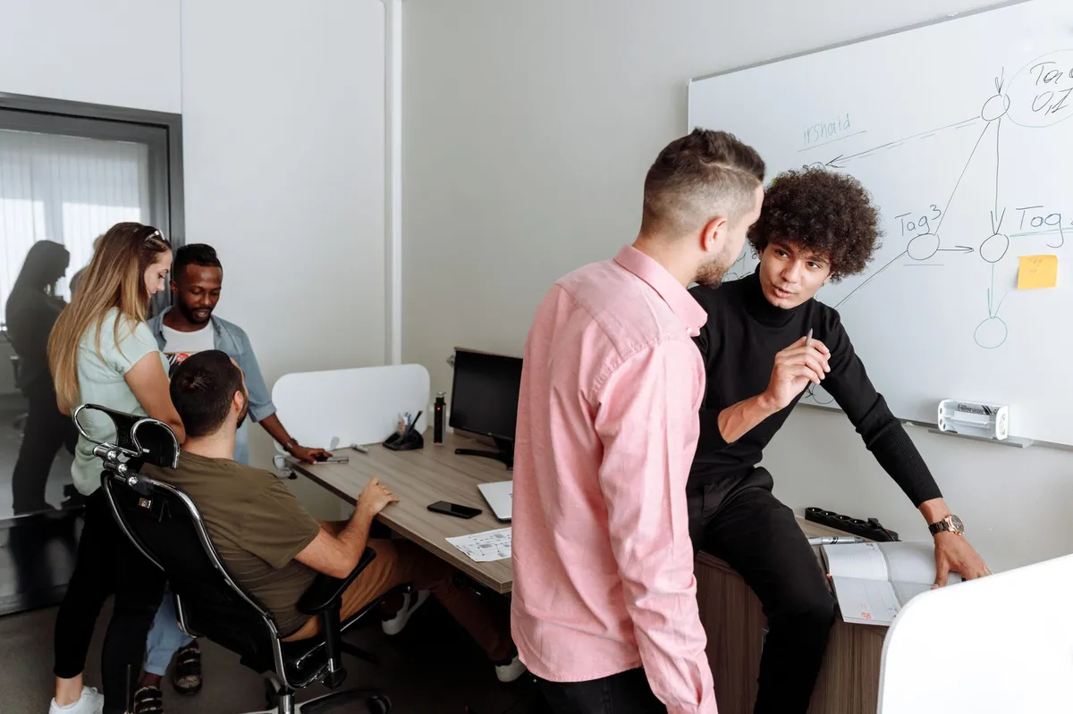 office workers discussing AI