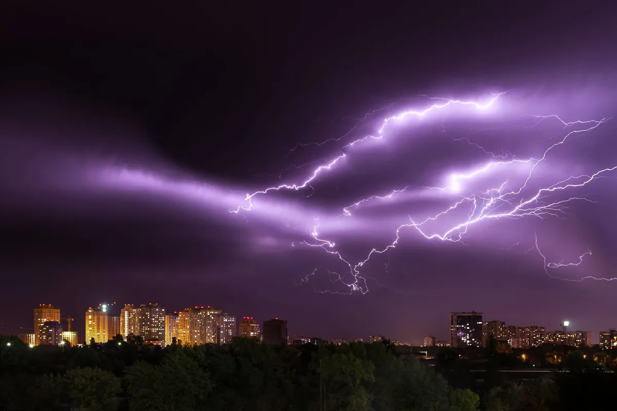 thunderstorm over city skyline