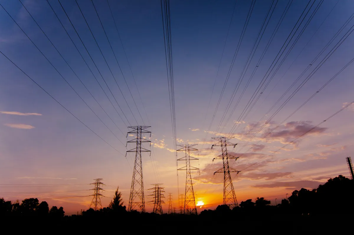 power lines against sunset