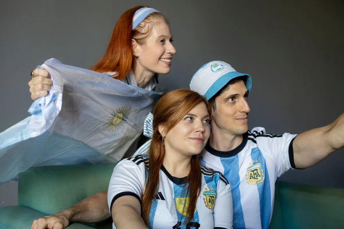 family using fans at home