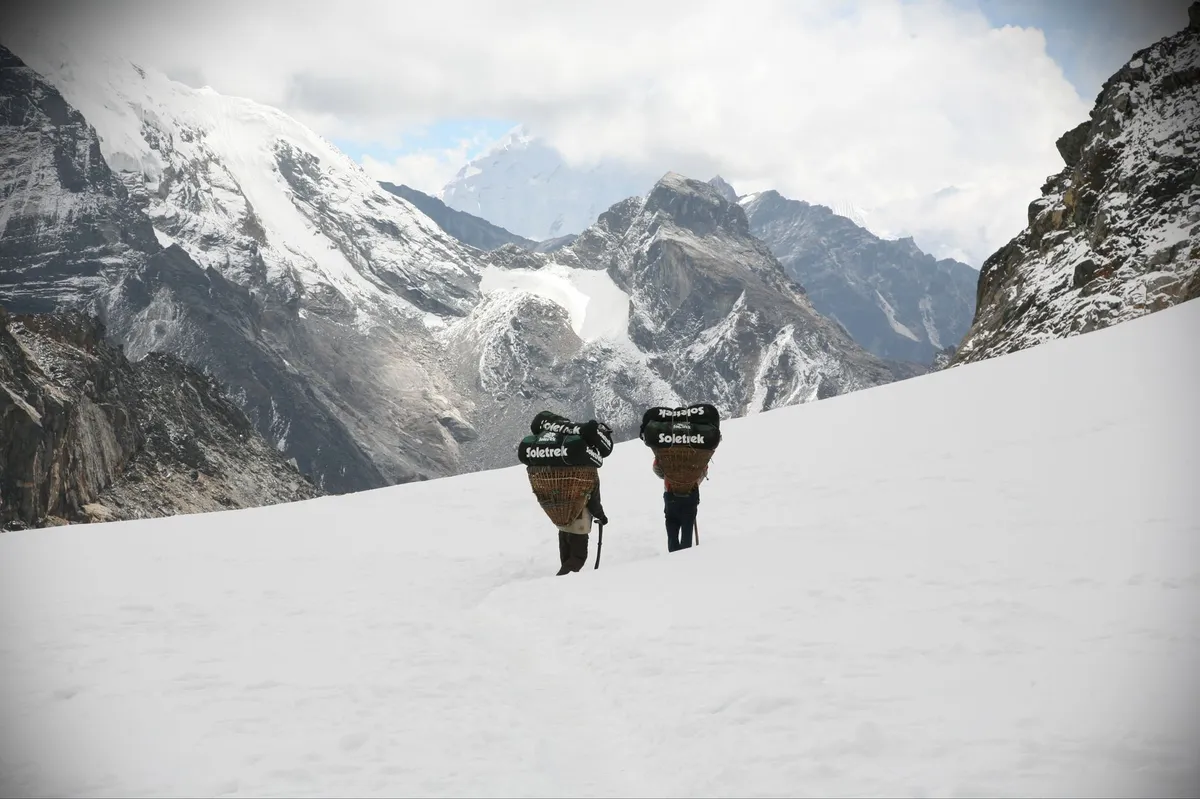 trekkers in Nepal mountains