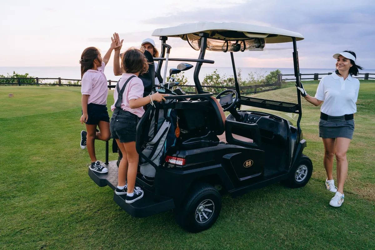 women golfing together
